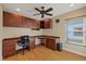Bright office space with built-in cabinetry, a desk, and ample natural light at 5141 Lansdowne Way, Palmetto, FL 34221