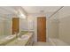 Bathroom featuring a sink, vanity, mirror, and a bathtub at 515 Rousseau Dr, Nokomis, FL 34275