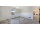 Spacious bedroom with a ceiling fan, window, and light walls at 515 Rousseau Dr, Nokomis, FL 34275