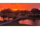 Dramatic sunset view over the golf course and lake at 5320 Hyland Hills Ave # 2222, Sarasota, FL 34241