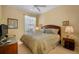Comfortable bedroom featuring a plush bed, soft lighting, and a peaceful ambiance at 5539 Octonia Pl, Sarasota, FL 34238