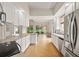 Well-lit kitchen featuring stainless steel appliances, granite counters and backyard view at 5539 Octonia Pl, Sarasota, FL 34238