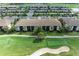 Scenic aerial view of a beautiful golf course community with lush green fairways, and well manicured landscapes at 5710 Palmer Cir # 204, Lakewood Ranch, FL 34211