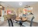 Open dining area with stylish furnishings and easy access to adjacent rooms at 6101 34Th W St # 33D, Bradenton, FL 34210