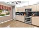 Cozy kitchen with stainless steel appliances, ample cabinet space and natural light at 6101 34Th W St # 33D, Bradenton, FL 34210