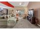 Spacious living room featuring comfortable seating and a sliding glass door to a balcony at 6101 34Th W St # 33D, Bradenton, FL 34210