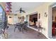 Relaxing covered patio with comfortable seating and ceiling fan and slider access to the interior at 6101 34Th W St # 33D, Bradenton, FL 34210