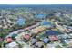 The aerial view showcases ponds and a golf course in the community at 6911 Stetson Street Cir, Sarasota, FL 34243