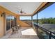 Balcony with seating overlooking the beautiful golf course and lake views at 6919 Winners Cir, Lakewood Ranch, FL 34202