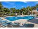 Community pool area offers a refreshing pool, comfortable lounge chairs, and ample space for relaxation at 8803 18Th Nw Ave, Bradenton, FL 34209