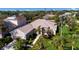 Beautiful single-Gathering home showcases lush landscaping, mature palm trees, and a two-car garage at 8803 18Th Nw Ave, Bradenton, FL 34209