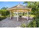 The community gazebo overlooking the lake is the perfect space for relaxation and nature at 8803 18Th Nw Ave, Bradenton, FL 34209