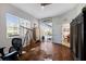 Home office featuring hardwood floors, a telescope and a view of the backyard at 8803 18Th Nw Ave, Bradenton, FL 34209