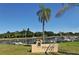 Palma Sola Park sign at a dock with boat slips and a view of the boats docked at 1111 Mallorca Dr, Bradenton, FL 34209