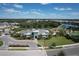 Community aerial view showcasing the clubhouse, pool, playground, sports courts, and beautiful surrounding homes at 12326 Blue Hill Trl, Bradenton, FL 34211
