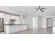 Modern kitchen featuring white cabinetry, stainless steel appliances, and granite countertops at 12326 Blue Hill Trl, Bradenton, FL 34211
