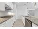 Well-equipped kitchen featuring a large island, and modern appliances at 12326 Blue Hill Trl, Bradenton, FL 34211