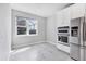 Bright breakfast nook with stainless steel appliances and a large window at 12326 Blue Hill Trl, Bradenton, FL 34211
