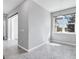 Inviting living room area featuring access to outdoor balcony at 12326 Blue Hill Trl, Bradenton, FL 34211