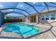 Relaxing screened-in pool area with brick pavers and access to the home at 12326 Blue Hill Trl, Bradenton, FL 34211