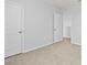 Neutral bedroom with carpeted floor and closet at 12716 Dusty Trail Dr, Sarasota, FL 34238