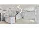 Modern kitchen and living area with stainless steel appliances at 12716 Dusty Trail Dr, Sarasota, FL 34238