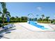 Community splash pad featuring a blue slide and recreational water features at 12716 Dusty Trail Dr, Sarasota, FL 34238