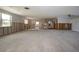 Renovations in progress in the expansive living room with open-concept kitchen space at 1541 Shelburne Ln, Sarasota, FL 34231