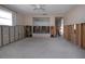 Spacious living room undergoing renovation with exposed framing and concrete flooring at 1541 Shelburne Ln, Sarasota, FL 34231