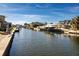 Waterfront canal view featuring boat docks and beautiful waterfront homes at 1541 Shelburne Ln, Sarasota, FL 34231