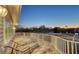 Outdoor balcony featuring lounge chairs and views of the pool and water views at dusk at 1543 Eastbrook Dr, Sarasota, FL 34231
