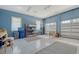 Clean garage space with ample room for parking and storage, with two garage doors and windows at 1543 Eastbrook Dr, Sarasota, FL 34231