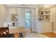 Craft room featuring sewing machine on table, and custom shelving for optimal storage at 1543 Eastbrook Dr, Sarasota, FL 34231