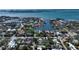 Stunning aerial view of waterfront property in a lush neighborhood with beautiful canal access at 1631 Loma Linda St, Sarasota, FL 34239