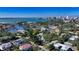 Stunning aerial view of the property showcasing its location and waterfront access with city views at 1631 Loma Linda St, Sarasota, FL 34239