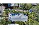 Overhead view of the property highlighting its mature landscaping and well-maintained roof at 1631 Loma Linda St, Sarasota, FL 34239
