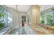 A bathroom featuring a sink, cabinets and window with natural light and decorative tile flooring at 1631 Loma Linda St, Sarasota, FL 34239