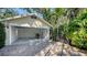Clean, well-lit garage interior with ample space, featuring a motorcycle at 1631 Loma Linda St, Sarasota, FL 34239