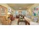 Cozy living room with fireplace, built-in shelving, and elegant decor at 1631 Loma Linda St, Sarasota, FL 34239