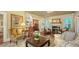 Cozy living room with fireplace, built-in shelving, and elegant furnishings at 1631 Loma Linda St, Sarasota, FL 34239