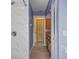 Bright bathroom with marble walk-in shower and wood cabinets at 17368 Norseman Ave, Port Charlotte, FL 33948