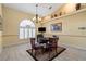 Eat-in kitchen area featuring tiled floors, recessed lights, and a chandelier light fixture at 17368 Norseman Ave, Port Charlotte, FL 33948