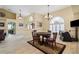 Eat-in kitchen area featuring tiled floors, recessed lights, and a chandelier light fixture at 17368 Norseman Ave, Port Charlotte, FL 33948