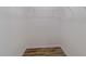 Walk-in closet featuring wood-look floors and a wire shelving unit at 3267 N Chamberlain Blvd, North Port, FL 34286