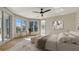 Spacious main bedroom with ensuite bath, sitting area, and balcony access with beautiful views at 3491 Bayou Sound, Longboat Key, FL 34228