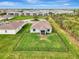 Aerial view of home showing a large fenced yard in a community at 3631 Pebble Ter, Punta Gorda, FL 33980