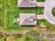 Aerial view of home showing roof detail and layout of the lot and neighborhood at 3631 Pebble Ter, Punta Gorda, FL 33980