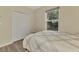 This bedroom has hard surface floors, closet doors and a window with a view at 3631 Pebble Ter, Punta Gorda, FL 33980