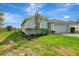 A single-Gathering home displays lush green lawns and well-maintained landscaping at 3631 Pebble Ter, Punta Gorda, FL 33980
