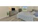 Comfortable main bedroom with hardwood floors, offering a relaxing retreat at 3631 Pebble Ter, Punta Gorda, FL 33980